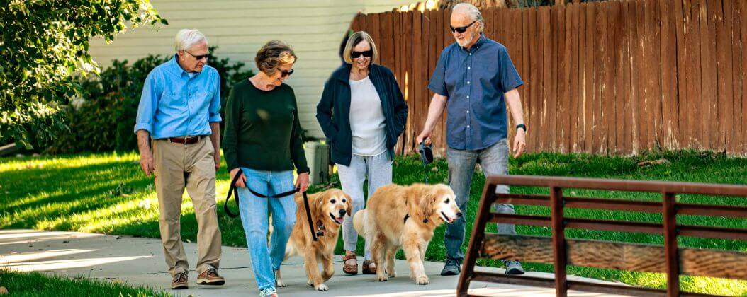 Holly Creek residents walking their dogs on nearby trail