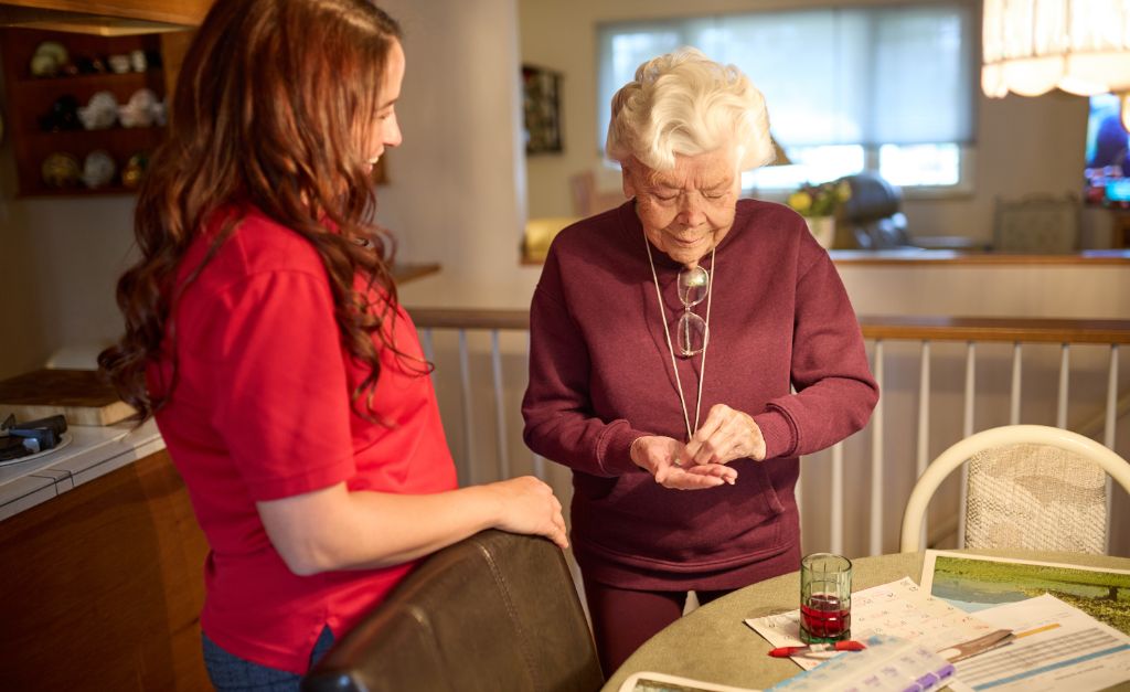 Home care partner providing medication management support