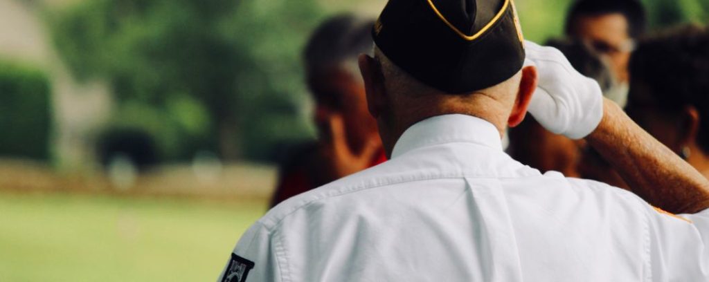 Military service member saluting