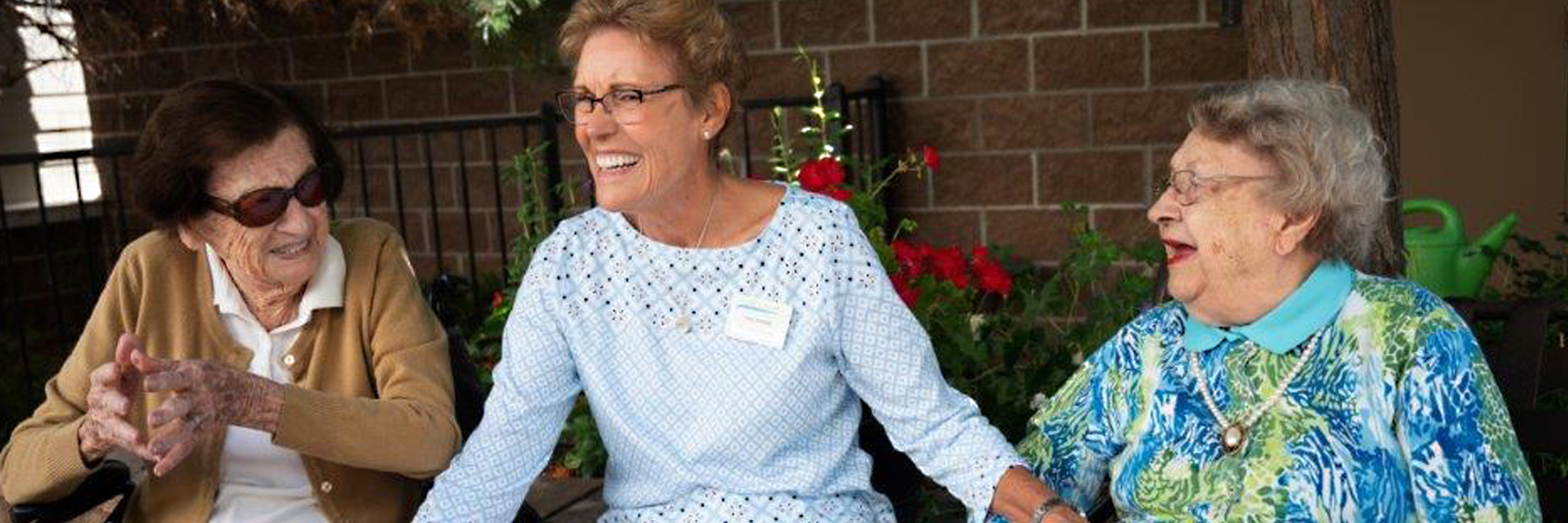 Colorado Gives Day - Care partner smiling with residents