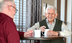 Sunny Vista residents smile over coffee