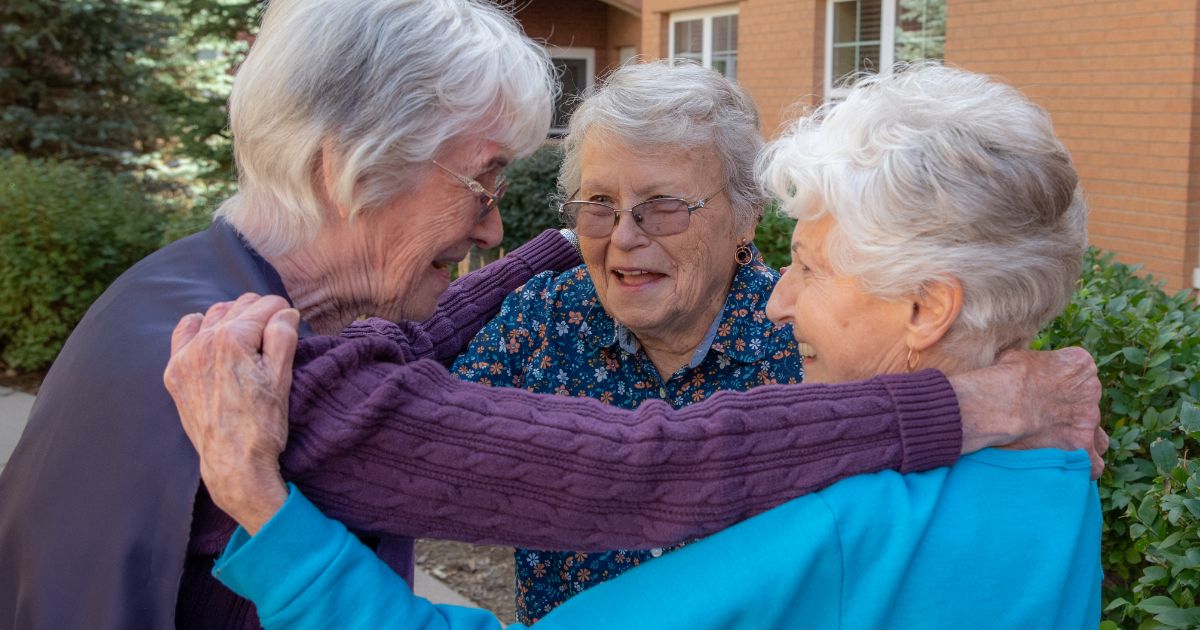 Residents hugging and experiencing citizenship