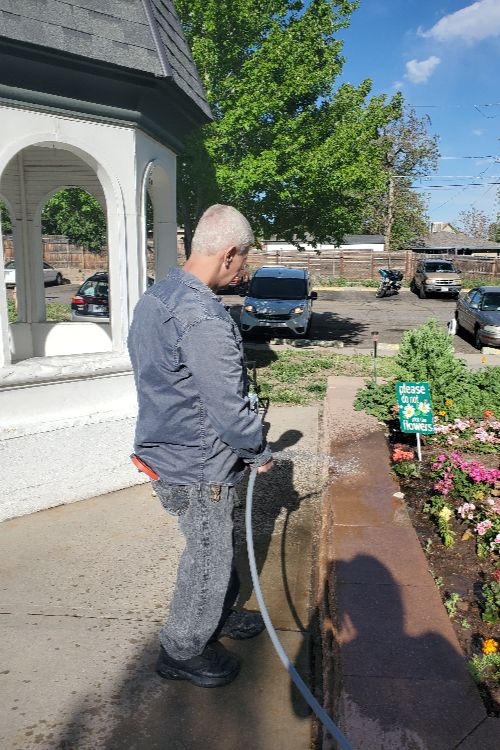 Dayspring Villa resident tends to community gardens