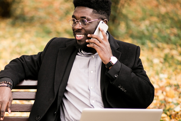 cdms man on phone with laptop cdms man on phone with laptop