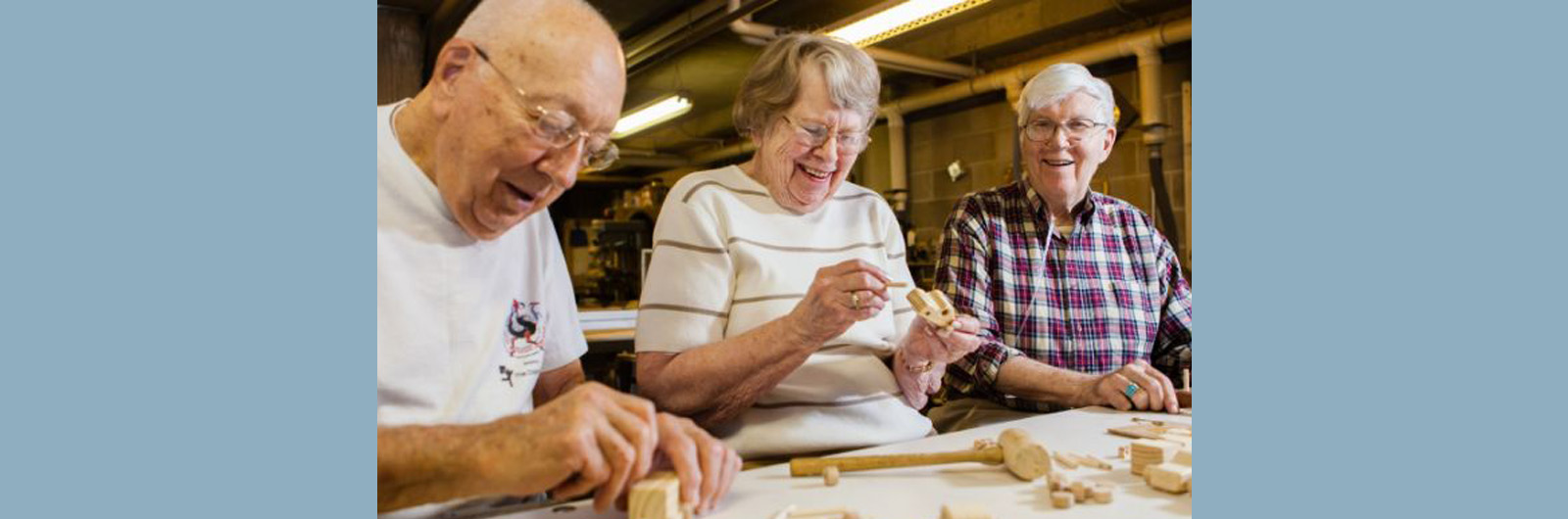 residents in woodshop for web