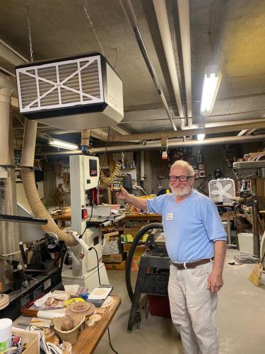 Bob Britt in the Someren Glen woodshop by the new air filter